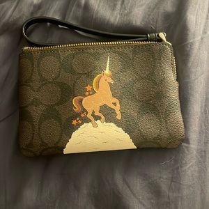 Coach Corner Zip Wristlet In Signature Canvas